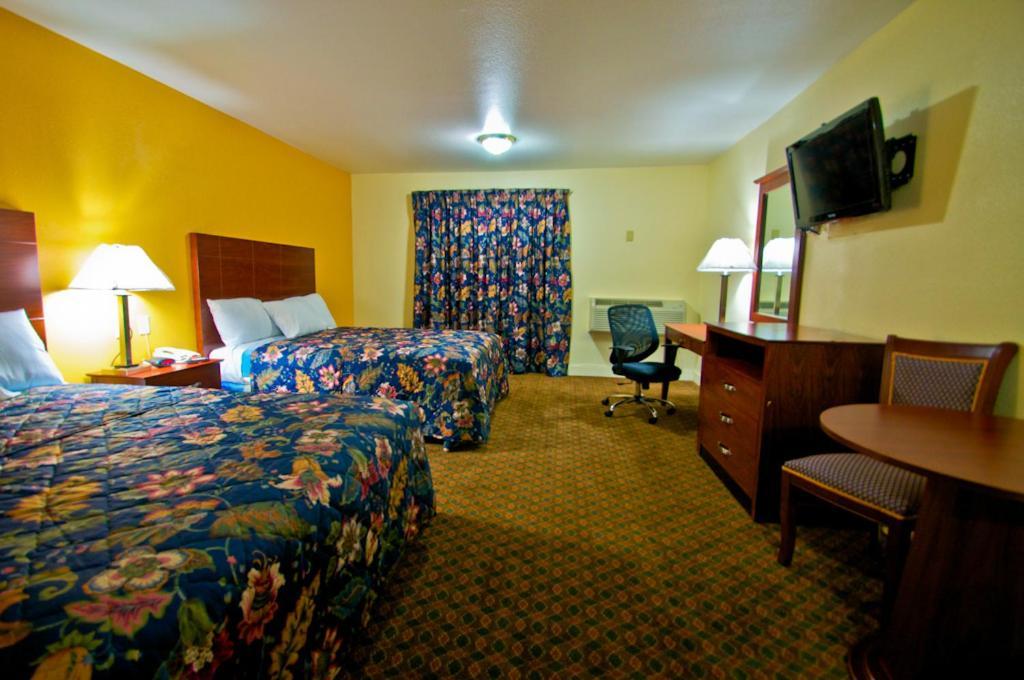 Passport Inn And Suites - Μιντλτάουν Δωμάτιο φωτογραφία